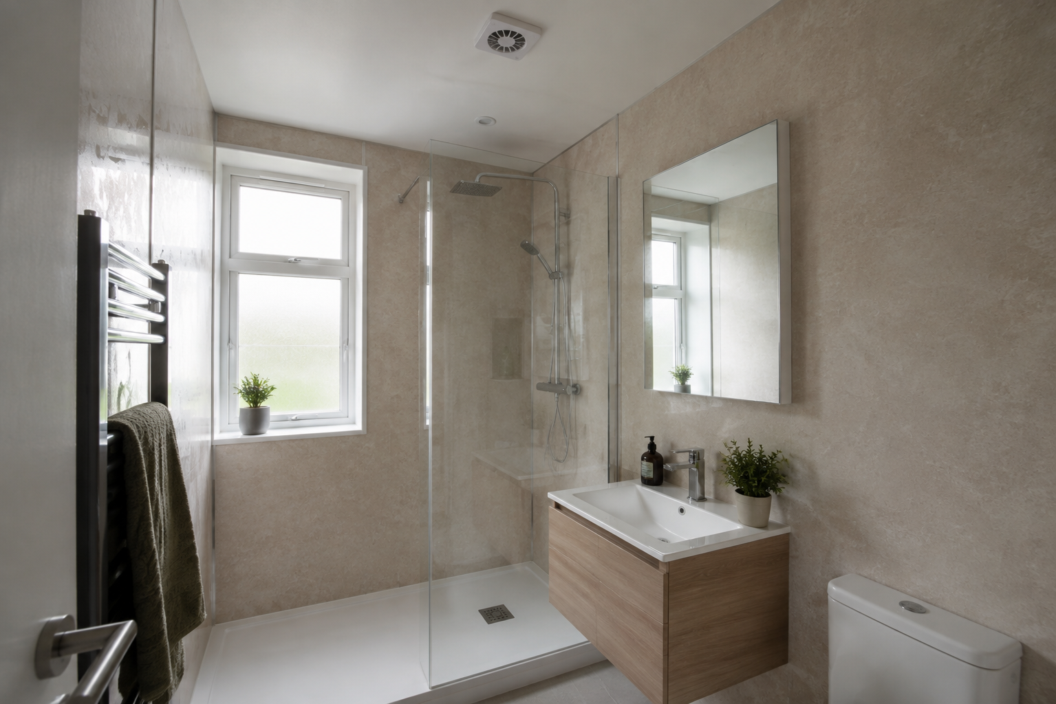 Compact bathroom with an extractor above the shower